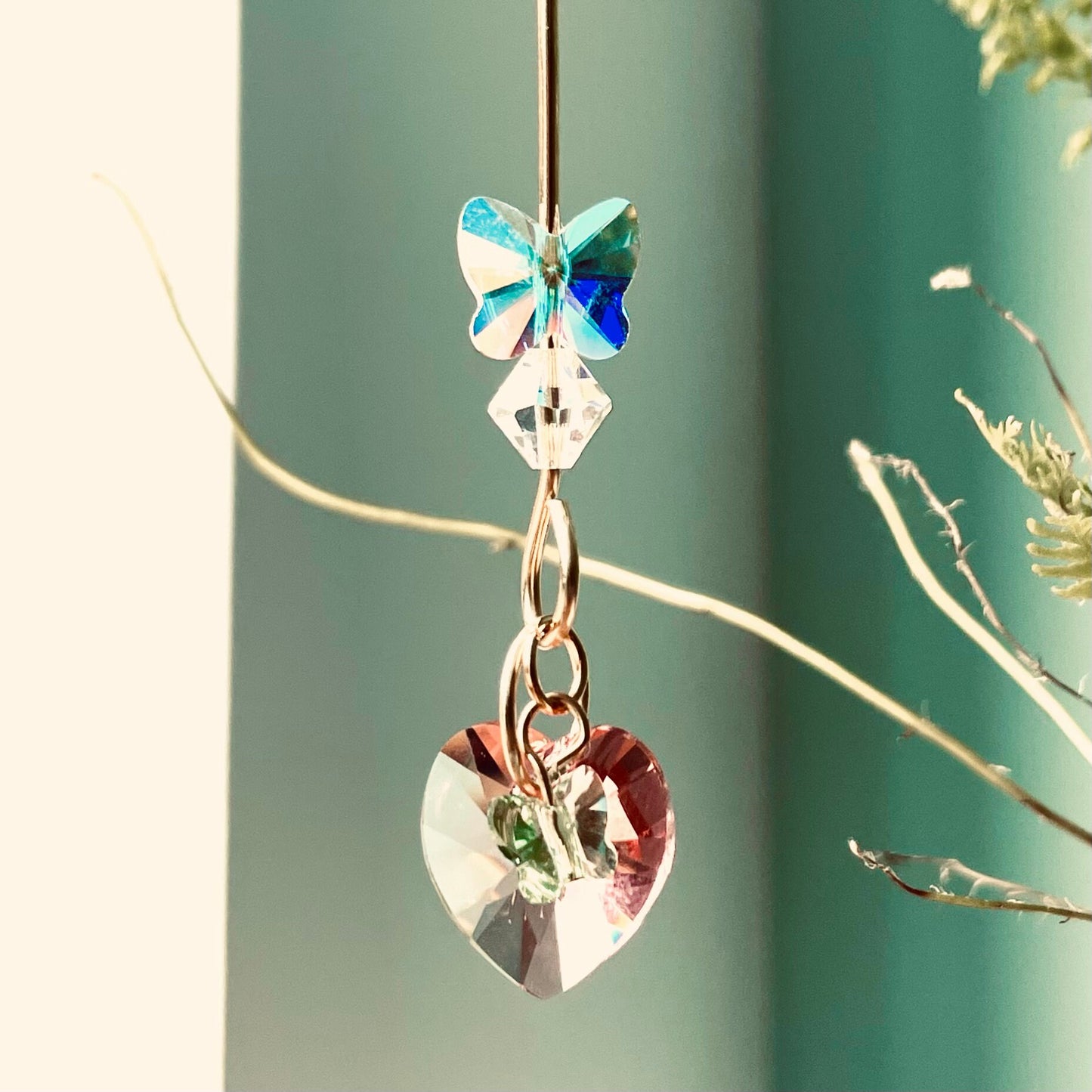 Handcrafted Crystal Heart and Butterfly Plant Suncatcher - Elegance and Joy for Your Green Retreat!